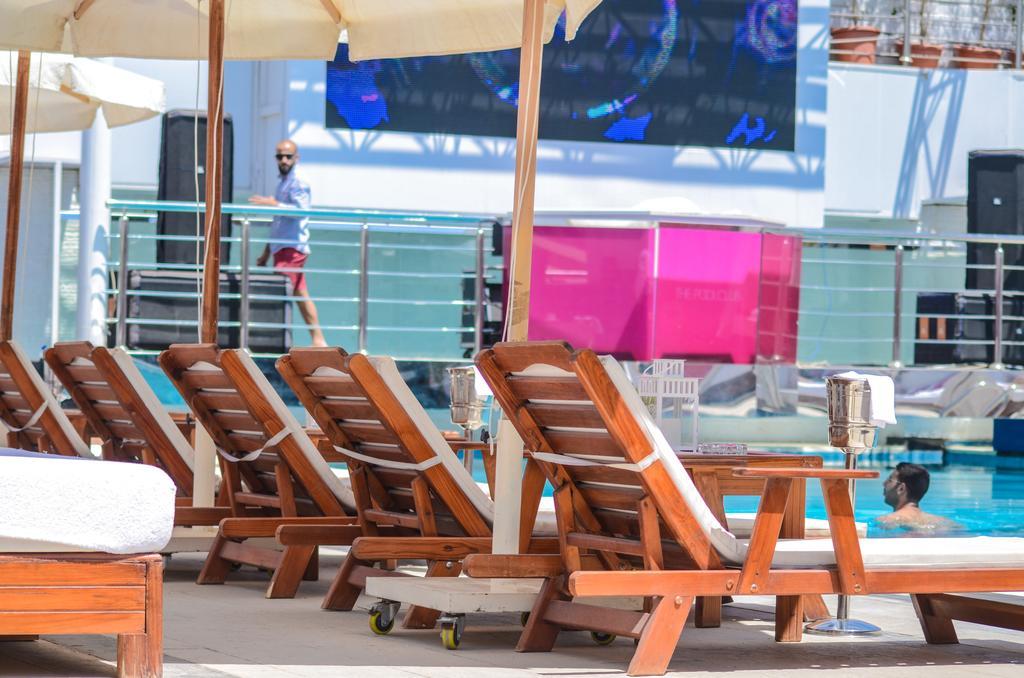 Sun City Hotel - The Gabriel Каир Экстерьер фото A row of lounge chairs on a cruise ship